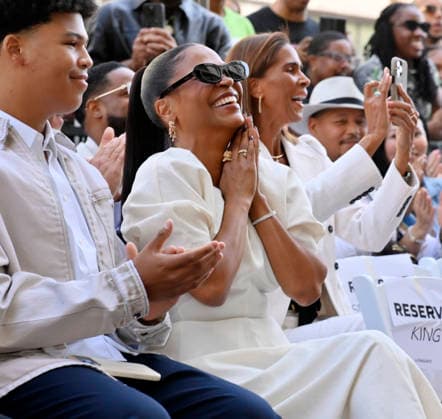 Actress Nia Long reacts to comments as her son Kez Sunday Udoka looks on during an unveiling ceremony honoring Long with the 2,857th star on the Hollywood Walk of Fame in Los Angeles on Wednesday, September 16, 2026.  LAP2026091640 JIMxRUYMEN