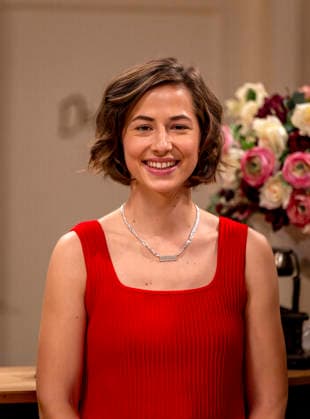September 16, 2026, ARD telenovela *STURM DER LIEBE*, photo shoot for Season 23 on the film set in Munich, at Bavaria Film in Geiselgasteig, in the studio set of the fictional Hotel Fürstenhof. The new season premieres on November 4, 2026. Actress Pippa Fee Rupperti, playing the role of Emilia Jakobi, at the reception desk on the set of the se