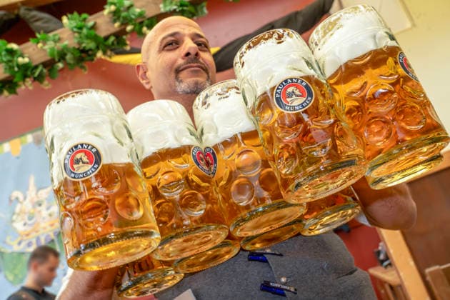 Oktoberfest 2026: A server brings 10 Maß of Paulaner beer to the tables during a press tour of the Wiesn, Munich, September 17, 2026, Germany, Munich, September 17, 2026: A server brings 10 Maß of Paulaner beer to the tables, Paulaner beer, in the Paulaner festival tent run by festival hos