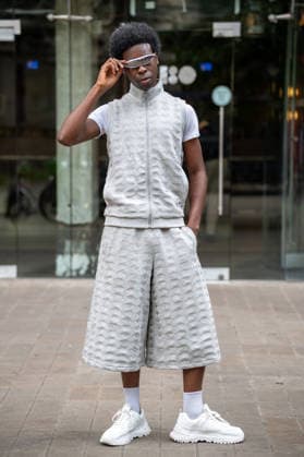 London Fashion Week in London - 17 Sep 2026 An attendee arrives wearing silver sunglasses and a matching silver suit at the Francesca Lake Womenswear and Menswear presentation, held at NEWGEN, 180 Strand, London, as part of London Fashion Week 2026. Models and members of the fashion industry arrive at NEWGEN, 180 Strand, London, for the Francesca Lake Womenswear and Menswear presentation during the London Fashion Week 2026. The presentation showcases the latest collections by British designer Francesca Lake as part of the official London Fashion Week schedule, bringing together models, fashion professionals, media and industry guests at the central London venue. London United Kingdom Copyright: xJamesxWilloughbyx xSOPAxImagesx JWILLOUGHBY_3418