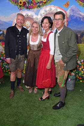 Michael Möller of Hofbräu München with his wife Irmgard Möller, and Jörg Lehmann of Hofbräu München with his wife Ute Lehmann at the HEIDIFEST 2026 at the Hofbräuhaus in Munich on September 17, 2026
