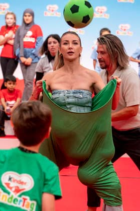 ABB CHILDREN S DAY Anna Carina Woitschack Catching a Ball in Big Pants at the Children s Day event at the Atelier Gardens Berlin on September 17, 2026