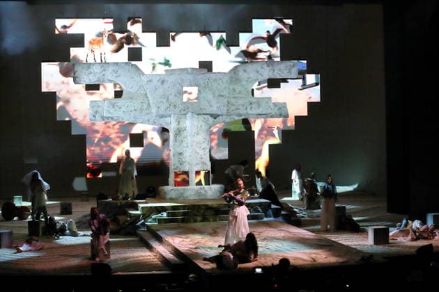Charlotte Bletton, flute, and the ensemble during the photo rehearsal for *Wednesday of Light* at the Deutsche Oper in Berlin, September 17, 2026. Opera by Karlheinz Stockhausen. Musical Director: Maxime Pascal. Director: Susanne Kennedy. Set Design: Markus Selg. Costume Design: Andra Dumitrascu. The premiere is on September 19, 2026, at the Deutsche Oper Berlin. *Wednesday of Light*