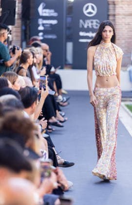 Custo Fashion Show at MBFW 2026 A model during the Custo Barcelona fashion show as part of Mercedes-Benz Fashion Week at Nebrija University on September 18, 2026, in Madrid, Spain. Custo presents its Spring Summer 2027 collection, titled Unexpected. The Catalan designer conceives this collection as an emotional manifesto to combat routine in the way we dress. SEPTEMBER 18, 2026, Madrid, Spain  Copyright: xEduardoxParrax 7783759