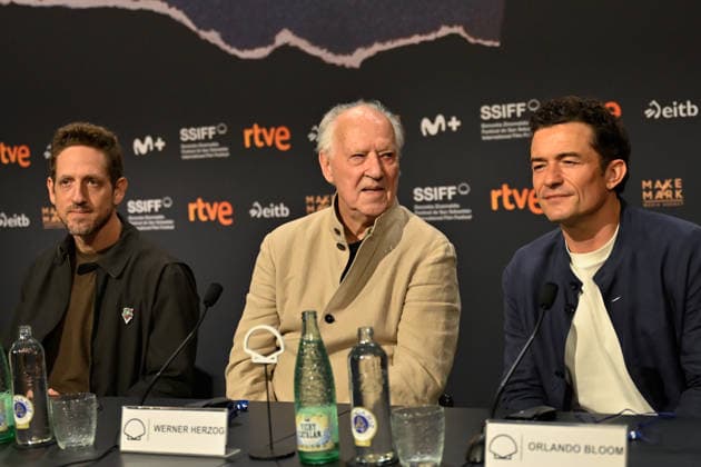 Werner Herzog Receives the Donostia Award at the San Sebastián Film Festival Director, screenwriter, producer, and actor Werner Herzog (c), accompanied by producer Ariel Leon Isacovitch (I) and actor Orlando Bloom (d), speaks with the media before receiving the Donostia Award, at the Kursaal on September 18, 2026, in San Sebastián, Guipúzcoa, Basque Country, Spain. Director, screenwriter, producer, and actor Werner Herzog will receive the Donostia Award in recognition of his career during the opening gala of the San Sebastián Film Festival, which will take place September 18–26 for its 74th edition. The Festival’s highest honorary distinction for the German filmmaker will be accompanied by a screening of his new feature film, ‘Bucking Fast Copyright: xArnaitzxRubiox 7783869