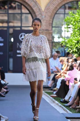 Custo Barcelona - Mercedes Benz Fashion Week Madrid, Spain - 18 Sept 2026 A model parades with Custo Barcelona design during Mercedes Benz Fashion Week Madrid Cibeles Palace in Madrid. Madrid Spain Copyright: xAtilanoxGarciax xSOPAxImagesx PHOTO08556