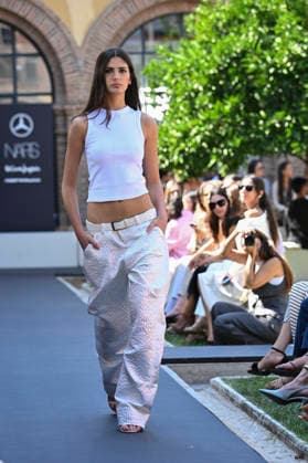 Custo Barcelona - Mercedes Benz Fashion Week Madrid, Spain - 18 Sept 2026 A model parades with Custo Barcelona design during Mercedes Benz Fashion Week Madrid Cibeles Palace in Madrid. Madrid Spain Copyright: xAtilanoxGarciax xSOPAxImagesx PHOTO08577