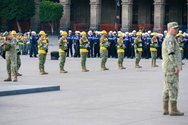 September 19, 2026: TO-45171-MEXICO , September 19, 2026. Mexican President Claudia Sheinbaum during the flag-lowering ceremony& x2014;with the flag flown at half-mast in memory of the victims of the 1985 and 2017 earthquakes& x2014;on the Z& xf3;calo esplanade today in Mexico City. Clasos.com.mx  - ZUMAcs4_ 20260919_faa_cs4_040 Copyright: xJavierxLiraxOterox