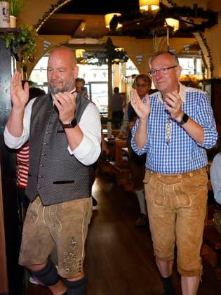 Björn Schwarz and Bernd Siggelkow at the Oktoberfest midday tapping ceremony at the Hofbräuhaus Berlin with Pastor Bernd Siggelhow