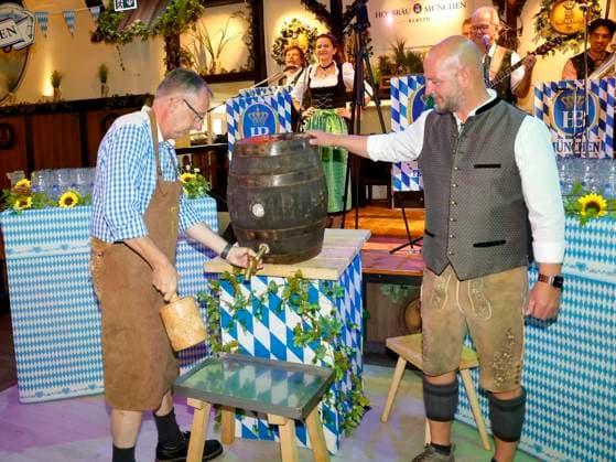 Bernd Siggelkow and Björn Schwarz at the keg tapping ceremony during the Oktoberfest Mittagsanstich at the Hofbräuhaus Berlin with Pastor Bernd Siggelhow