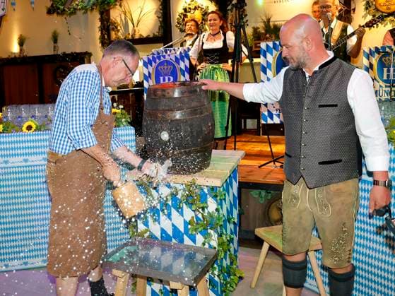 Bernd Siggelkow and Björn Schwarz at the keg tapping ceremony during the Oktoberfest Mittagsanstich at the Hofbräuhaus Berlin with Pastor Bernd Siggelhow