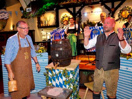 Bernd Siggelkow and Björn Schwarz at the Oktoberfest noon tapping ceremony at the Hofbräuhaus Berlin with Pastor Bernd Siggelhow