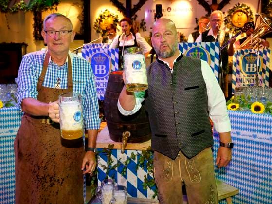 Bernd Siggelkow and Björn Schwarz at the keg-tapping ceremony during the Oktoberfest lunchtime tapping at the Hofbräuhaus Berlin with Pastor Bernd Siggelhow
