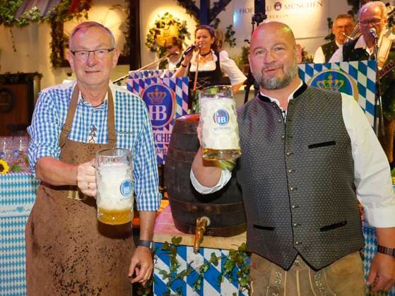 Bernd Siggelkow and Björn Schwarz at the keg-tapping ceremony during the Oktoberfest lunchtime tapping at the Hofbräuhaus Berlin with Pastor Bernd Siggelhow