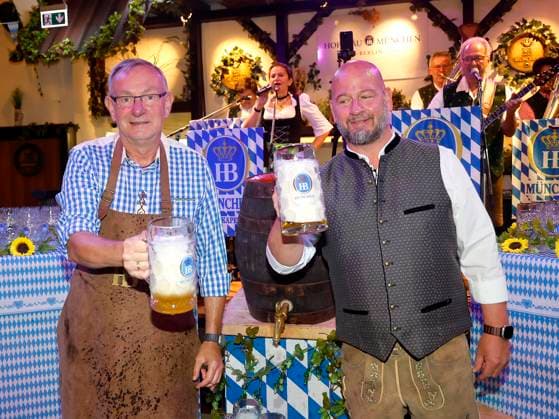 Bernd Siggelkow and Björn Schwarz at the keg-tapping ceremony during the Oktoberfest lunchtime tapping at the Hofbräuhaus Berlin with Pastor Bernd Siggelhow