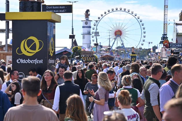 Ferris wheel, crowds of visitors, throngs of people, large crowds on September 20, 2026, at the 191st Oktoberfest, held from September 19 to October 4, 2026, at the Theresienwiese in Munich