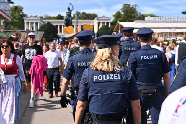 Police officers and police patrol the 191st Oktoberfest, held from September 19 to October 4, 2026, at the Theresienwiese in Munich on September 20, 2026