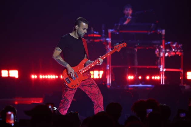 Chris Wolstenholme of Muse performs on stage during the iHeartRadio Music Festival Concerts at T-Mobile Arena in Las Vegas, Nevada on Saturday, September 19, 2026.  LAV20260919020 JAMESxATOA