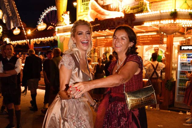 Verena Kerth and Claudia Obert during the 2026 Oktoberfest in front of the Almauftrieb at Theresienwiese on September 20, 2026, in Munich, Germany; Oktoberfest: the Almauftrieb at Theresienwiese in Munich, Germany