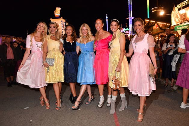 Julia Pohl, Annika Gassner, Sinta Weisz, Natascha Gruen, Sylvia Walker, Rebecca Kunikowski, and Marion Moser during the 2026 Oktoberfest in front of the Almauftrieb at Theresienwiese on September 20, 2026, in Munich, Germany; Oktoberfest: the Almauftrieb at Theresienwiese in Munich, Germany