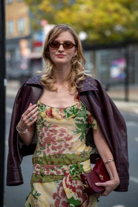 Attendees arrive at the Erderm Catwalk Show London, UK - 20 Sept 2026 An attendee arrives at the Erdem catwalk wearing a silk dress and leather jacket, held at the Roundhouse in Camden, London, as part of London Fashion Week 2026. Models and members of the fashion industry gather at the Roundhouse in Camden, London, for the Erdem catwalk show during London Fashion Week 2026. The event forms part of the official London Fashion Week schedule, bringing together models, designers, fashion professionals, media and guests for the presentation of Erdem s latest collection. London United Kingdom Copyright: xJamesxWilloughbyx xSOPAxImagesx JWILLOUGHBY_3469
