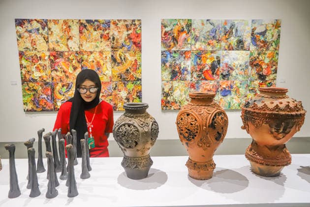 September 20, 2026, Surabaya, East Java, Indonesia: Visitors observe contemporary artworks at the ArtSubs 2026 exhibition at Balai Pemuda, Surabaya, East Java, Indonesia, on September 20, 2026. Titled border, threshold, beyond, the art exhibition features 500 works by 113 artists from across Indonesia, serving as a response to the public s need for a space of contemplation, reflection, and entertainment. Surabaya Indonesia - ZUMAp290 20260920_zip_p290_034 Copyright: xRendyxAgungxPrakosox