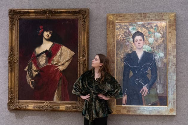 Bonhams 19th Century and British Impressionist Art Sale Photocall at Bonhams, London, UK - 21 September 2026 A staff member views (L) - Titianella by Juana Romani (est. Â£10k - Â£15k) and (R) - Dame aux lilas by Edgar Maxence (est. Â£30k - Â£50k) which is to go on auction at Bonhams 19th Century and British Impressionist Art Sale on 23rd September 2026 at Bonhams in London, England, UK on Monday 21 September, 2026., Credit:Justin Ng Avalon UK, England, London, Bonhams  Copyright: xJustinxNgx xAvalonx 1137029900