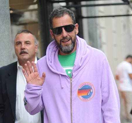RECORD DATE NOT STATED IPA88808753 - Milan, photo by Mimmo Carriero—After stopping by Bacaro, a restaurant on Via Montenapoleone, Adam Sandler strolls through the streets of downtown. He is recognized immediately, and people ask him for photos and autographs, which he grants without hesitation. His wife Jackie follows him at a distance so as not to be recognized or photographed, and after entering the hotel—thinking no one is watching—they let themselves go, kissing and embracing before heading up to their room.  Copyright: xx xx IPA88808753