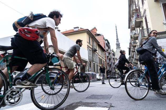 September 23, 2026, Turin, To, Italy: A human bike path to raise awareness about cycling deaths and accidents. Yesterday, Tuesday, September 22, a seven-year-old boy died while cycling to school. Turin, September 23, 2026. Turin Italy  - ZUMAa289 20260923_zia_a289_026 Copyright: xSelenexDanielex xAgfx