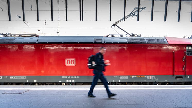 Regional Express at Münster Westfalen Station with the Deutsche Bahn AG logo Regional Express at Münster Westfalen Station with the Deutsche Bahn AG logo, Münster, North Rhine-Westphalia, Germany, Central Station
