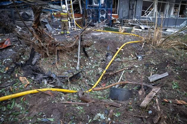 September 26, 2026, Kyiv, Ukraine: KYIV, UKRAINE, SEPTEMBER 26, 2026: Firefighters work at a five-story residential building damaged during a Russian drone attack in KyivÃ¢â‚¬â ¢s Solomianskyi district, as residents watch emergency operations and clear shattered glass from the area. Kyiv authorities said a fire broke out at the residential building and a ground-floor shop following the fall of a drone, injuring four people and prompting rescuers to evacuate 20 residents. Kyiv Ukraine  - ZUMAq101 20260926_zna_q101_100 Copyright: xNastassiaxKantorowiczxTorresx