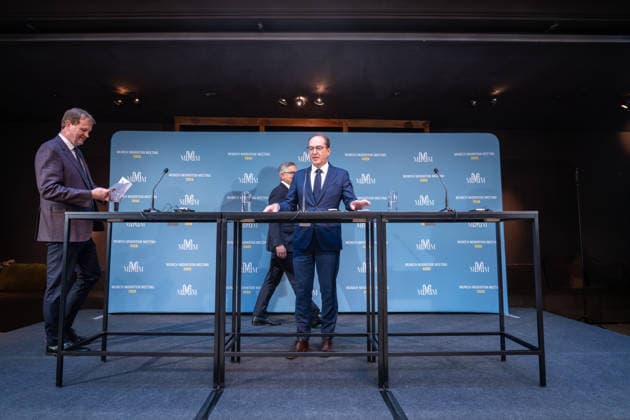 Alexander Dobrindt, German Federal Minister of the Interior and host of the meeting, walking alongside Magnus Brunner, EU Commissioner for Home Affairs and Migration (on the left), during their joint press statement at the start of the meeting; Jim O’Callagh