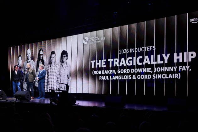 September 26, 2026, Toronto, On, Canada: Paul Langlois, left to right, Rob Baker and Gord Sinclair of The Tragically Hip speak after being inducted into the Canadian Songwriters Hall of Fame on stage in Toronto, on Saturday, Sept. 26, 2026. Toronto Canada  - ZUMAc35_ 20260926_zaf_c35_186 Copyright: xSammyxKoganx