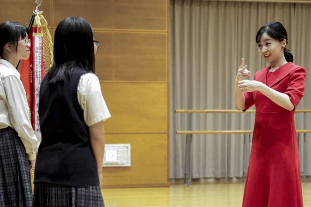 Sign language contest in western Japan Japanese Princess Kako (R) communicates via sign language with winners of a national high school sign language contest in Tottori, western Japan, on Sept. 27, 2026. (Pool photo)  A14AA0005628953P