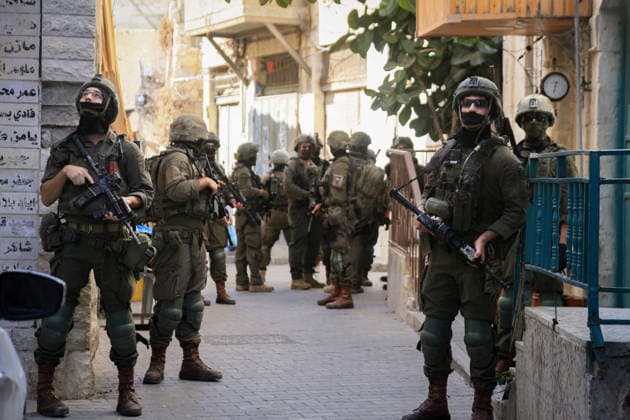 Israeli Soldiers Deploy During Raid in Nablus Old City Israeli soldiers deploy during a raid on the Old City of Nablus, West Bank, on September 27, 2026. Israeli forces entered the city and spread through several areas, including streets leading toward the Old City. Local sources reported searches and arrests, and said 12 students suffered from tear gas inhalation after gas canisters were fired near a school close to the Old City. Photo by Mohammed Nasser apaimages Nablus West Bank Palestinian Territory 270926_Nablus_MN_00(13) Copyright: xapaimagesxMohammedxNasserx xapaimagesx