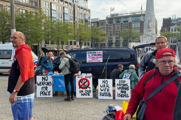 NETHERLANDS, AMSTERDAM - SEPTEMBER 27, 2026: Activists hold a rally against militarisation and for peace with Russia in Dam Square. Natalya Blinova TASS  98429451