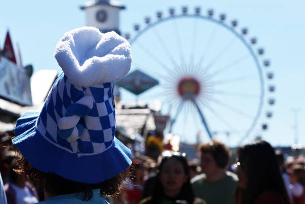 Germany world s largest beer festival Oktoberfest visitor wears a Bavarian hat during the world s largest beer festival Oktoberfest in Munich, Germany, September 27th , 2026 . Photo by Davide Elias Copyright: xDavidexEliasx