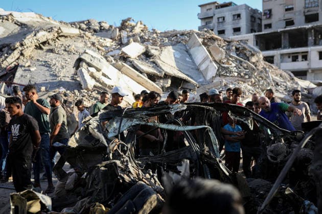 Palestinians Gather at Site of Israeli Strike in Gaza City Palestinians gather at the site of an Israeli airstrike that targeted a vehicle near al-Sinaa junction in Gaza City on September 27, 2026. The strike killed one Palestinian and wounded others, according to local sources. Photo by Bilal Osama apaimages Gaza city Gaza Strip Palestinian Territory 270926_Gaza_BO_01(11) Copyright: xapaimagesxBilalxOsamax xapaimagesx