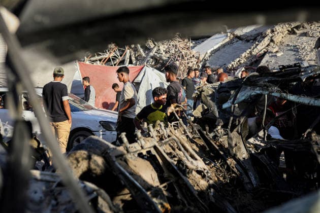 Palestinians Gather at Site of Israeli Strike in Gaza City Palestinians gather at the site of an Israeli airstrike that targeted a vehicle near al-Sinaa junction in Gaza City on September 27, 2026. The strike killed one Palestinian and wounded others, according to local sources. Photo by Bilal Osama apaimages Gaza city Gaza Strip Palestinian Territory 270926_Gaza_BO_01(13) Copyright: xapaimagesxBilalxOsamax xapaimagesx