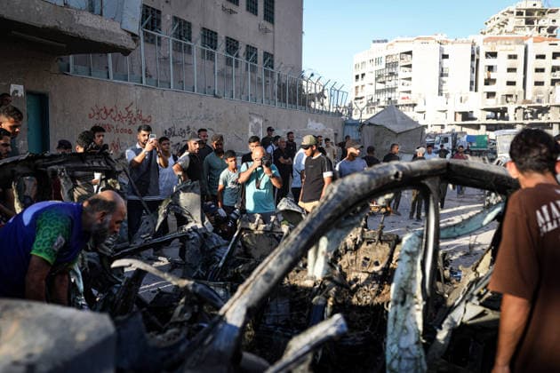 Palestinians Gather at Site of Israeli Strike in Gaza City Palestinians gather at the site of an Israeli airstrike that targeted a vehicle near al-Sinaa junction in Gaza City on September 27, 2026. The strike killed one Palestinian and wounded others, according to local sources. Photo by Bilal Osama apaimages Gaza city Gaza Strip Palestinian Territory 270926_Gaza_BO_01(15) Copyright: xapaimagesxBilalxOsamax xapaimagesx