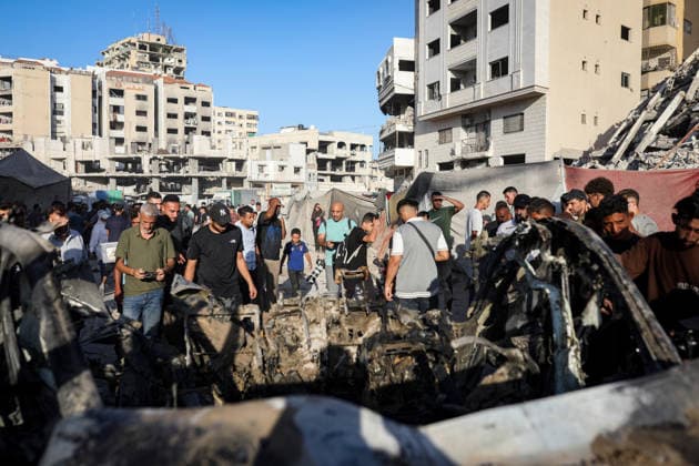 Palestinians Gather at Site of Israeli Strike in Gaza City Palestinians gather at the site of an Israeli airstrike that targeted a vehicle near al-Sinaa junction in Gaza City on September 27, 2026. The strike killed one Palestinian and wounded others, according to local sources. Photo by Bilal Osama apaimages Gaza city Gaza Strip Palestinian Territory 270926_Gaza_BO_01(3) Copyright: xapaimagesxBilalxOsamax xapaimagesx