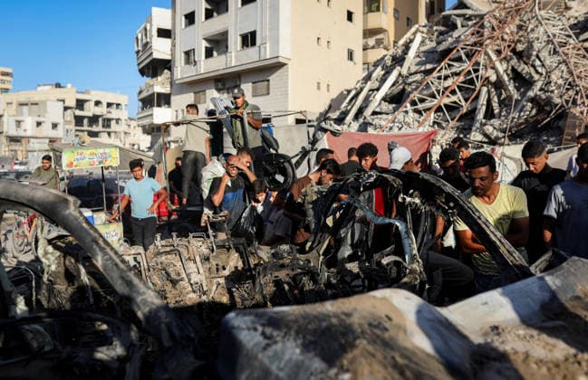 Palestinians Gather at Site of Israeli Strike in Gaza City Palestinians gather at the site of an Israeli airstrike that targeted a vehicle near al-Sinaa junction in Gaza City on September 27, 2026. The strike killed one Palestinian and wounded others, according to local sources. Photo by Bilal Osama apaimages Gaza city Gaza Strip Palestinian Territory 270926_Gaza_BO_01(6) Copyright: xapaimagesxBilalxOsamax xapaimagesx