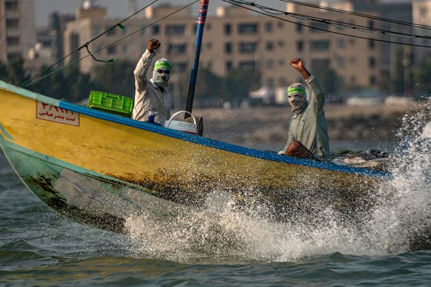Members of Iran s paramilitary Basij Force take part in a military drill during the Janfada Iran exercise on the Iranian coast of Kandal, overlooking the Strait of Hormuz, Iran, on Sunday, September 27, 2026. The exercise comes amid continuing regional tensions and heightened security measures around the Strait of Hormuz, one of the world s most strategically important waterways.  IRN2026092701 BehnamxTofighi
