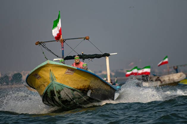 Members of Iran s paramilitary Basij Force take part in a military drill during the Janfada Iran exercise on the Iranian coast of Kandal, overlooking the Strait of Hormuz, Iran, on Sunday, September 27, 2026. The exercise comes amid continuing regional tensions and heightened security measures around the Strait of Hormuz, one of the world s most strategically important waterways.  IRN2026092702 BehnamxTofighi