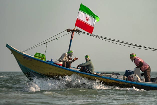 Members of Iran s paramilitary Basij Force take part in a military drill during the Janfada Iran exercise on the Iranian coast of Kandal, overlooking the Strait of Hormuz, Iran, on Sunday, September 27, 2026. The exercise comes amid continuing regional tensions and heightened security measures around the Strait of Hormuz, one of the world s most strategically important waterways.  IRN2026092704 BehnamxTofighi