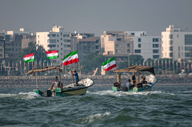 Members of Iran s paramilitary Basij Force take part in a military drill during the Janfada Iran exercise on the Iranian coast of Kandal, overlooking the Strait of Hormuz, Iran, on Sunday, September 27, 2026. The exercise comes amid continuing regional tensions and heightened security measures around the Strait of Hormuz, one of the world s most strategically important waterways.  IRN2026092709 BehnamxTofighi