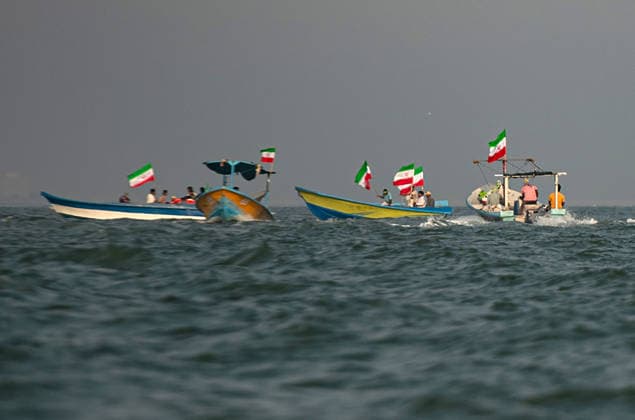 Members of Iran s paramilitary Basij Force take part in a military drill during the Janfada Iran exercise on the Iranian coast of Kandal, overlooking the Strait of Hormuz, Iran, on Sunday, September 27, 2026. The exercise comes amid continuing regional tensions and heightened security measures around the Strait of Hormuz, one of the world s most strategically important waterways.  IRN2026092710 BehnamxTofighi