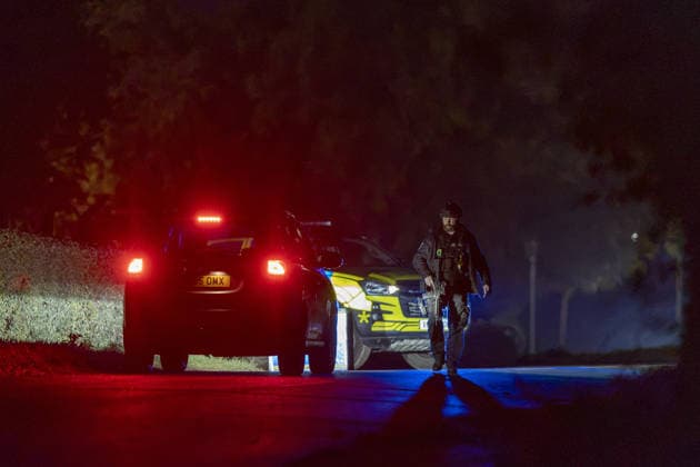 Counter-terror investigation after major incident declared at RAF Fairford FAIRFORD, UK - SEPTEMBER 27: Armed police maintain road blocks and security checks around RAF Fairford, Gloucestershire, United Kingdom, after a major incident was declared on September 27, 2026. Five men have been arrested on suspicion of plotting a car bomb attack against RAF Fairford. The military base hosts US Air Force bombers involved in the conflict with Iran. Marcin Nowak Anadolu Fairford United Kingdom. Editorial use only. Please get in touch for any other usage.  Copyright: x2026xAnadoluxMarcinxNowakx