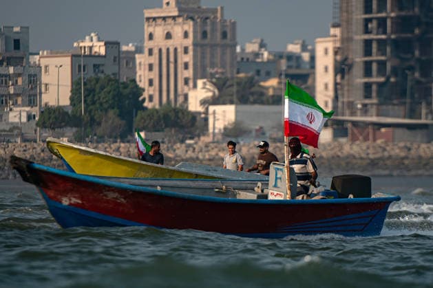 Members of Iran s paramilitary Basij Force take part in a military drill during the Janfada Iran exercise on the Iranian coast of Kandal, overlooking the Strait of Hormuz, Iran, on Sunday, September 27, 2026. The exercise comes amid continuing regional tensions and heightened security measures around the Strait of Hormuz, one of the world s most strategically important waterways.  IRN2026092714 BehnamxTofighi