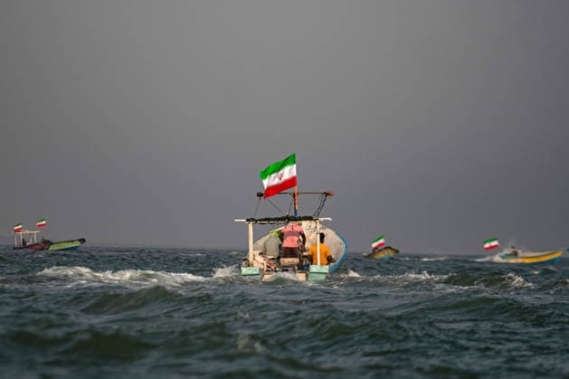 Members of Iran s paramilitary Basij Force take part in a military drill during the Janfada Iran exercise on the Iranian coast of Kandal, overlooking the Strait of Hormuz, Iran, on Sunday, September 27, 2026. The exercise comes amid continuing regional tensions and heightened security measures around the Strait of Hormuz, one of the world s most strategically important waterways.  IRN2026092716 BehnamxTofighi